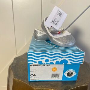 NWT. Nativ silver glitter slip ons